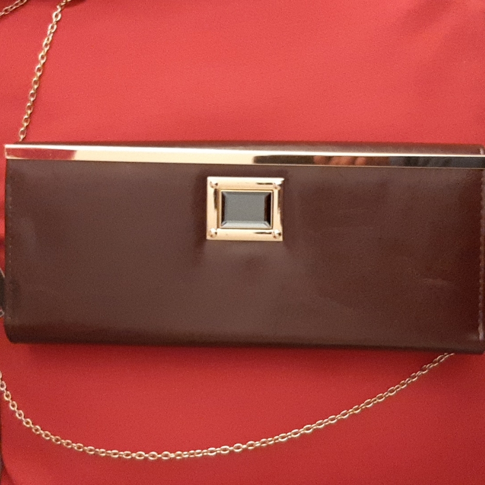 REBECCA & RIFKA/  COLOR/ COGNAG handbag.New with tags.